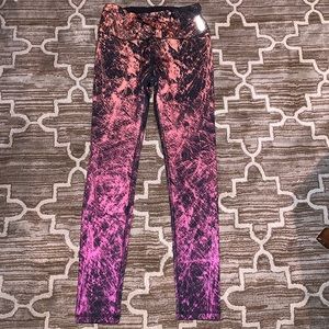 Colorful patterned athletic leggings. RBX active.